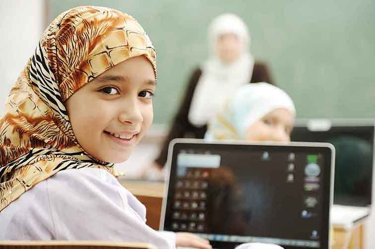 female quran tutor teaching kids